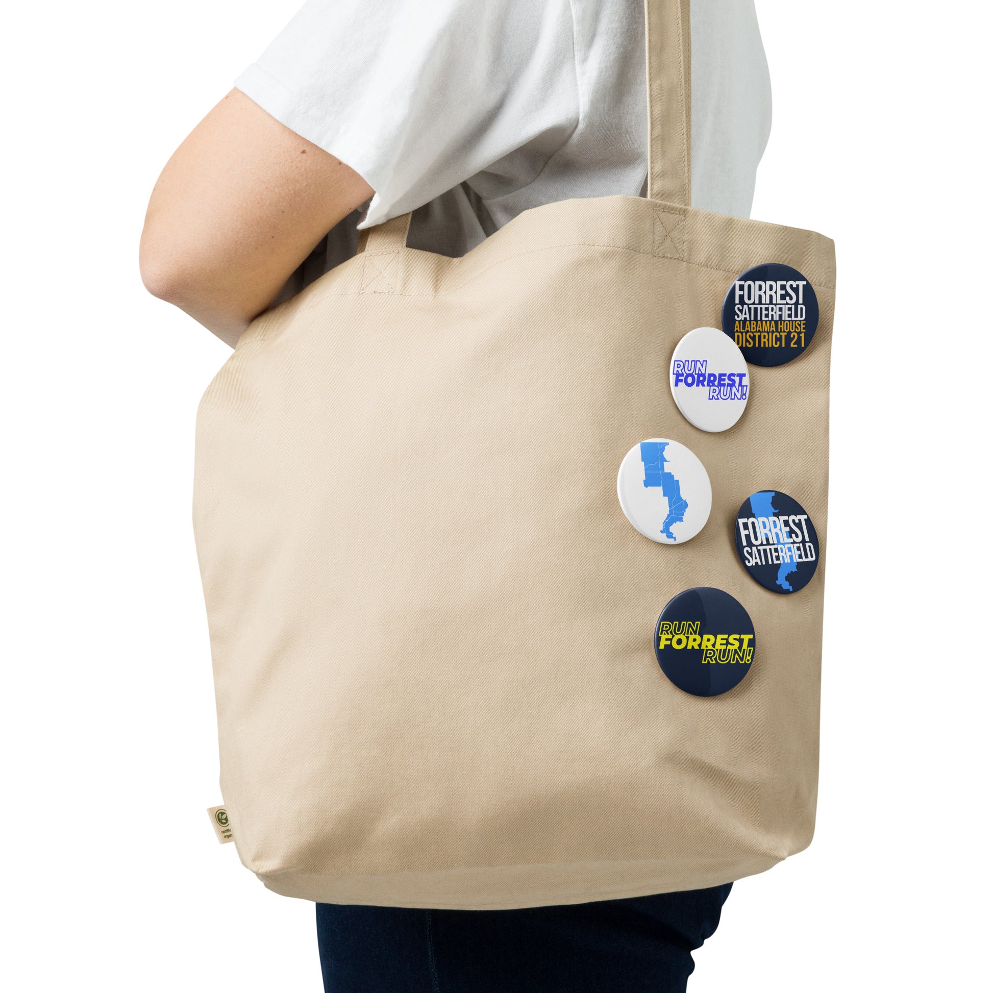 Close-up front view of the glossy 2.25-inch campaign buttons in navy, white, and gold for Forrest Satterfield, Alabama House District 21